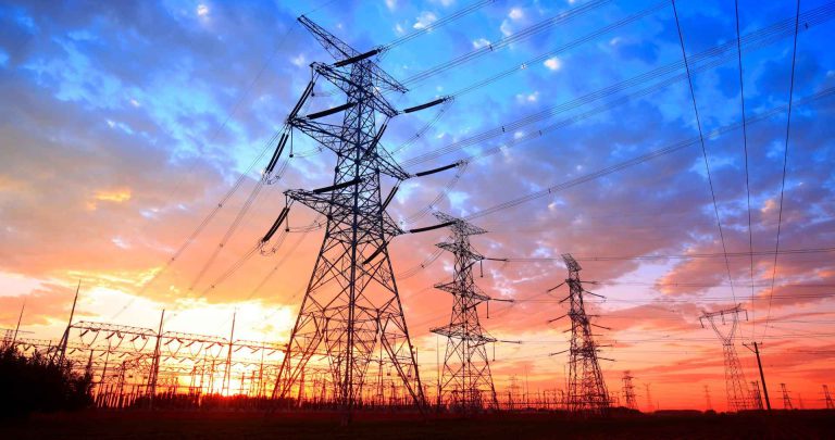 power lines against colorful sky