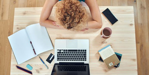 woman sitting at computer at desk