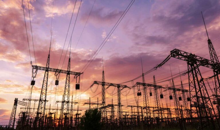 power lines against sunset clouds