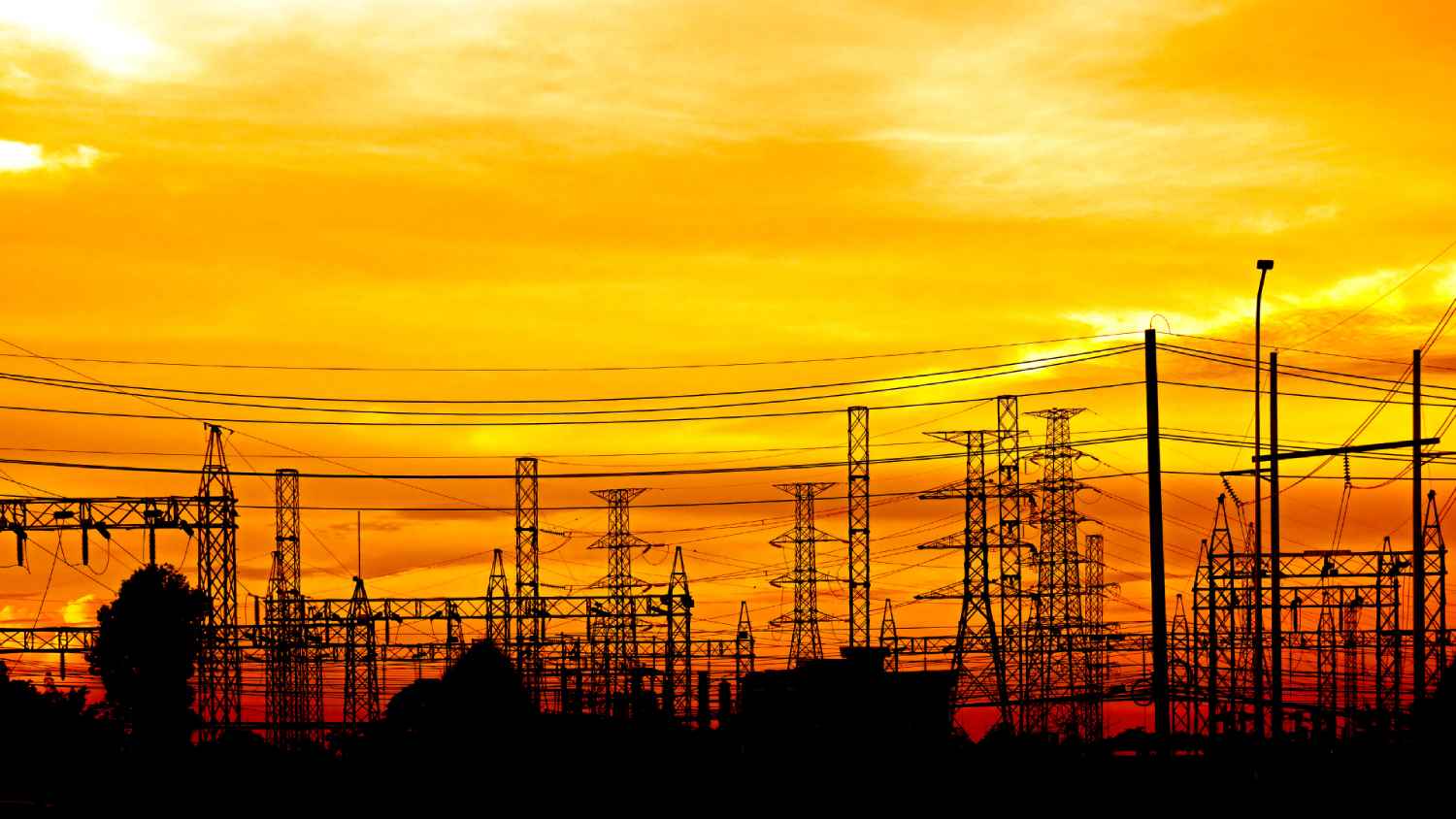power substation against oranger sky