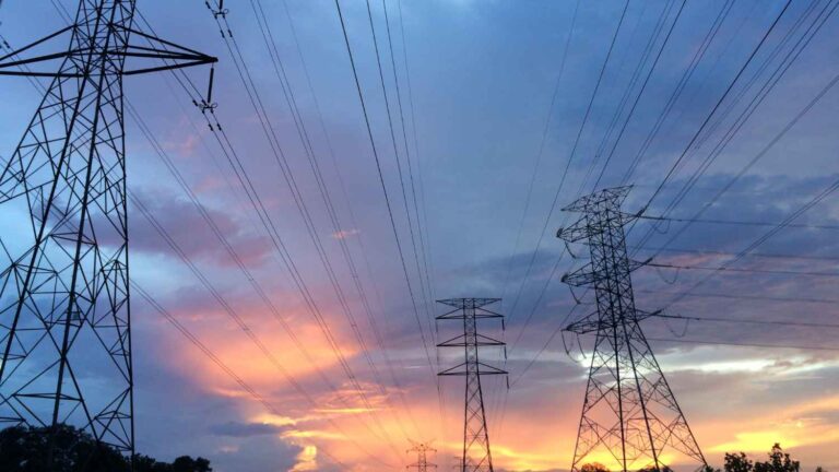 sunrise over power lines